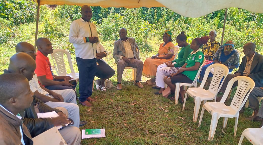 EYCBO members  during signing of voluntary wetland protection and conservation agreement with farmers whose land boarder river Firatsi in Butere sub-county, of Kakamega county.
