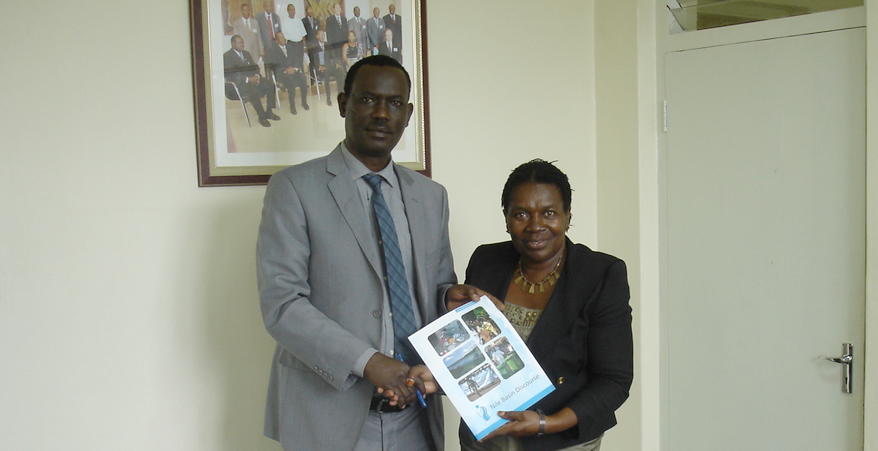 The NBI Executive Director Eng. Innocent Ntabana receives the welcome letter and the stakeholder mapping report from the NBD Regional Manager Dr. Hellen Natu